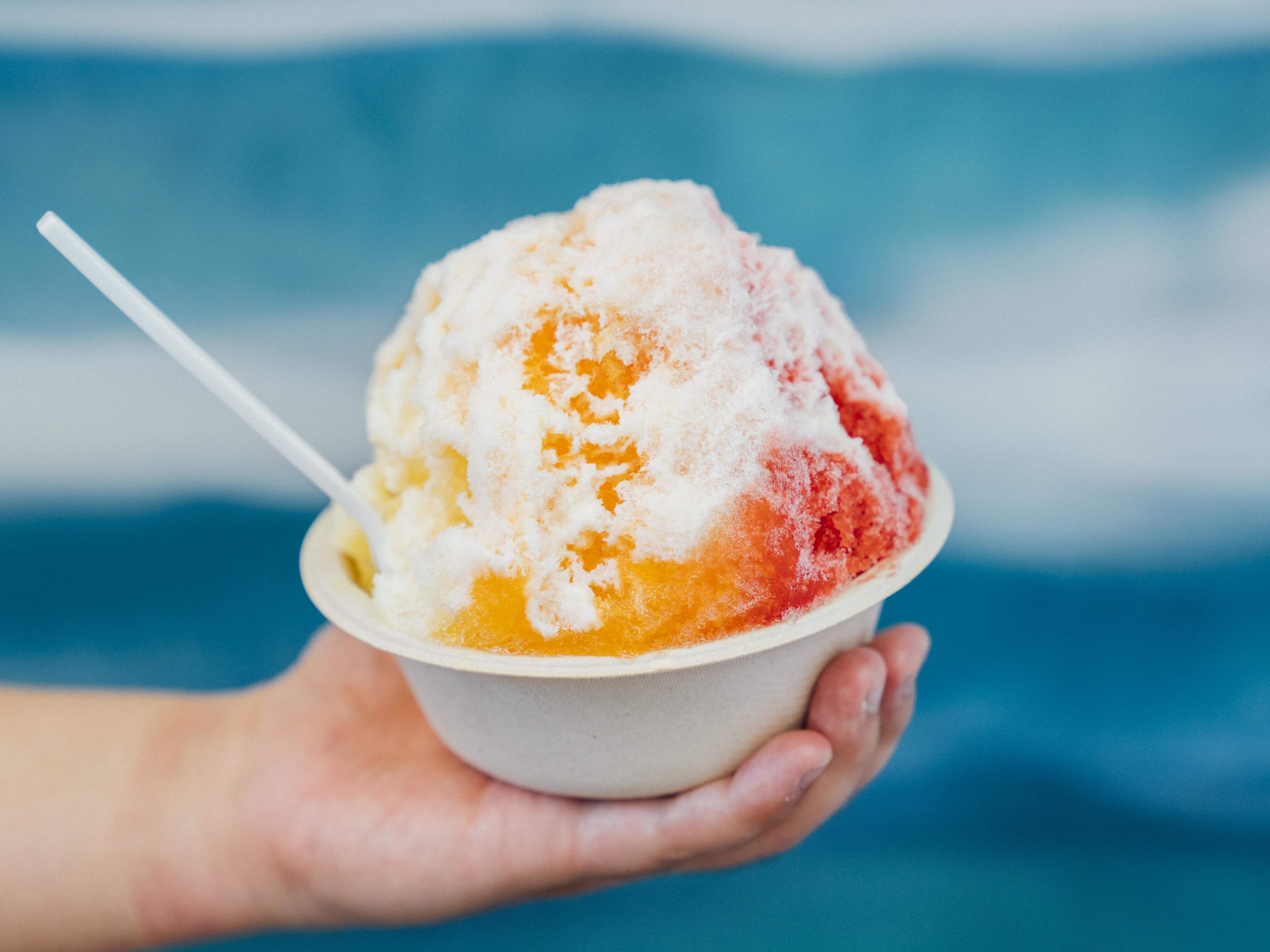 Premium Hawaiian shave ice with vibrant colors and toppings